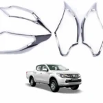Imagen de camioneta con un kit de biseles de focos cromados para mitsubishi l200 compatible con modelos del 2016 al 2019