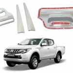 Una camioneta blanca junto con una manilla de portalon trasero cromado para mitsubishi l200 compatible con modelos del 2016 al 2019