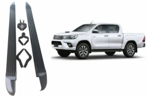 Estribos para camioneta toyota hilux revolution del año 2016 al 2022 con una camioneta gris al costado